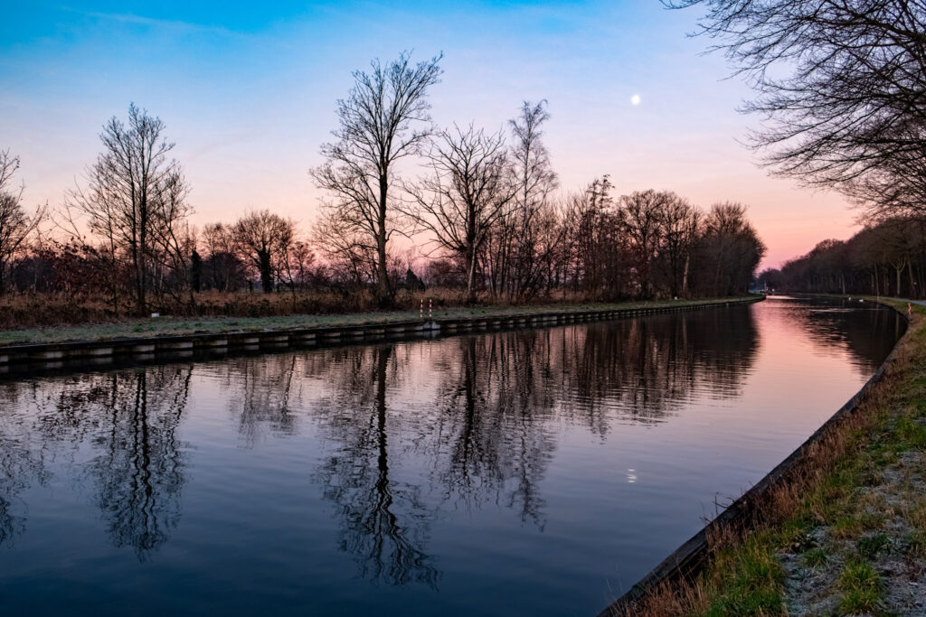 Capturing Autumn's Essence: Fall canal with trees and moon at dusk, avoiding pitfalls.
