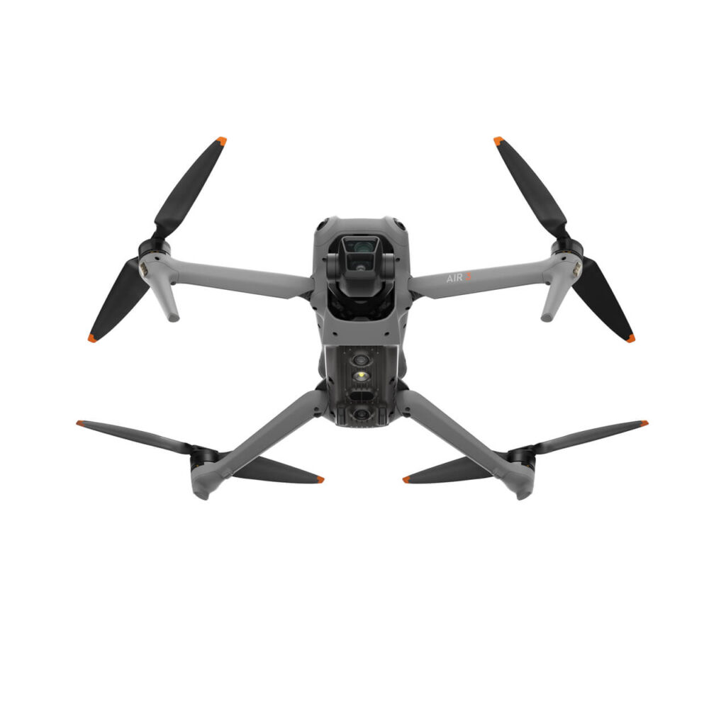 The DJI Phantom quadcopter is flying on a white background, in comparison with the Mavic 3 Pro.