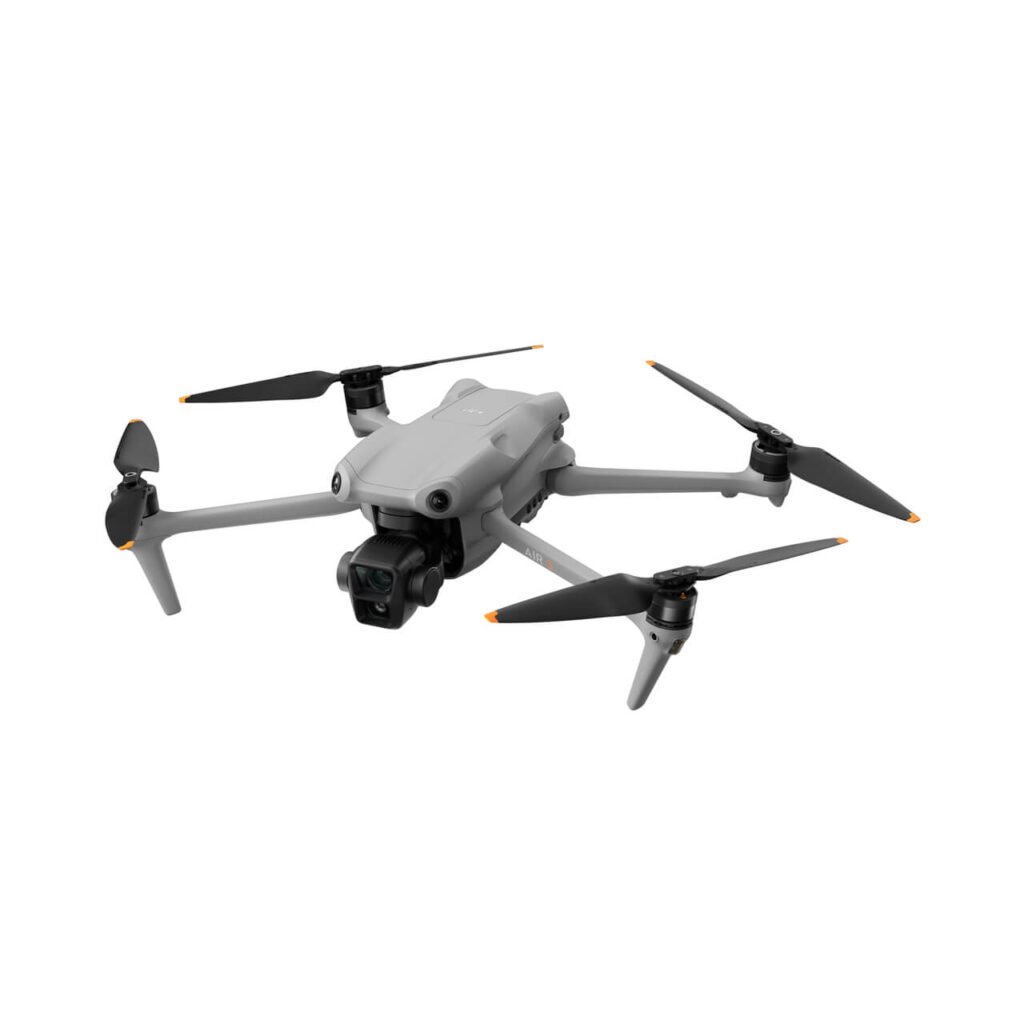 A DJI Mavic Pro drone flying on a white background.